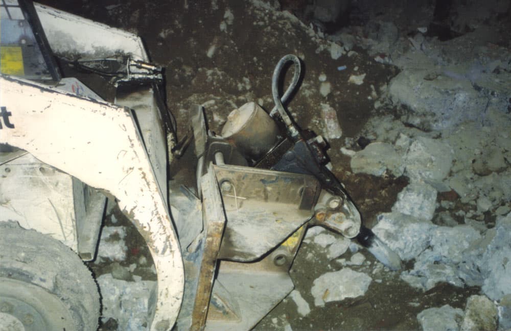 Excavation area cleared after concrete debris from a patio or slab was removed